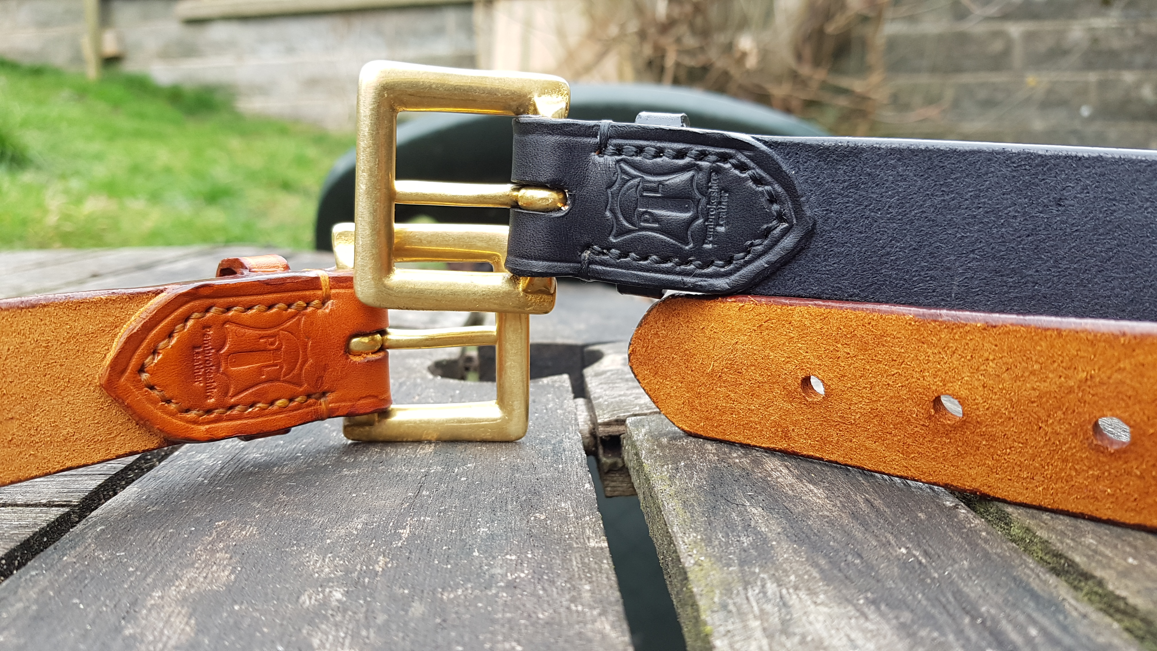 Two belts similar to those bought by M